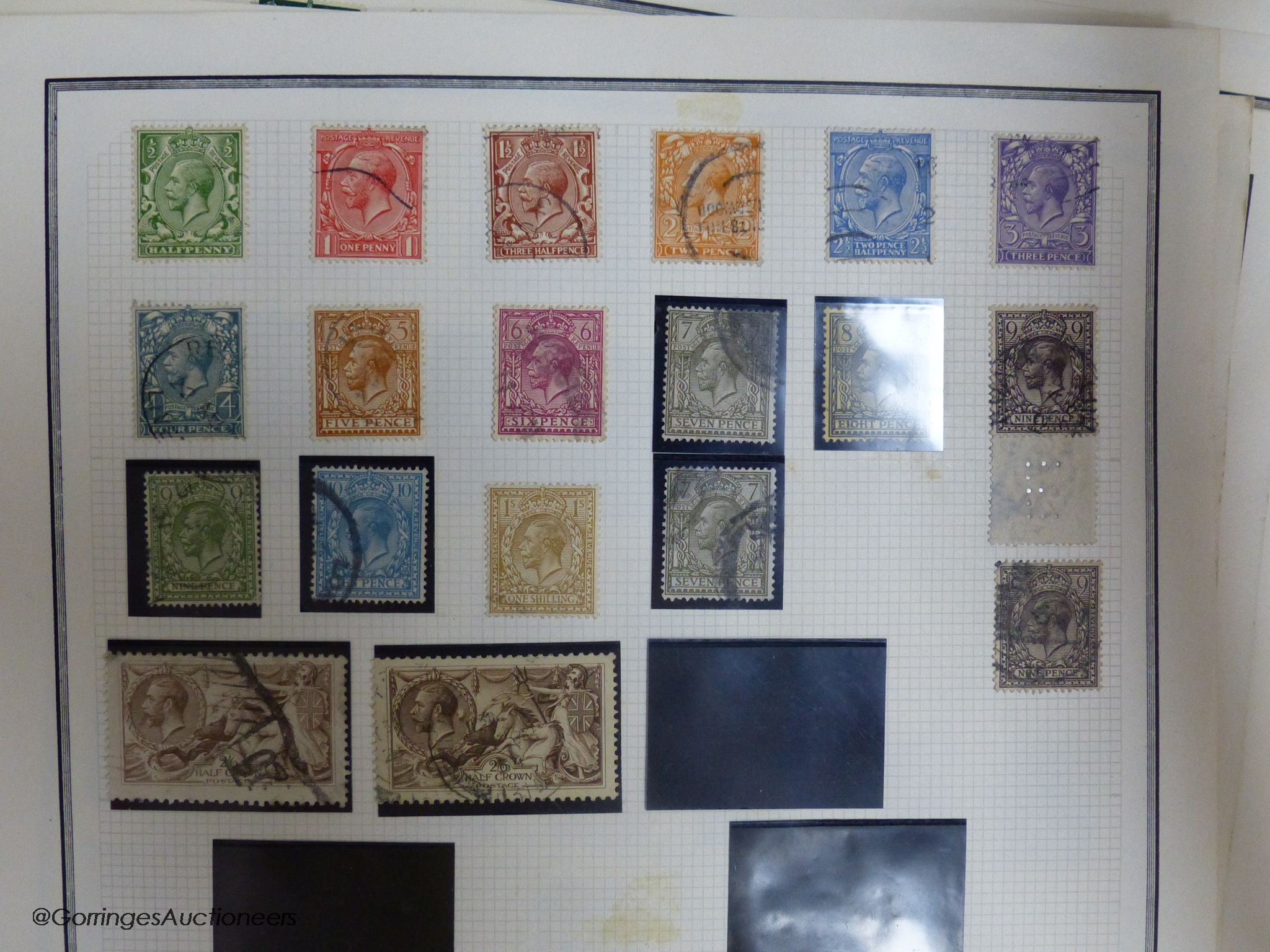 A folder containing early GB stamps